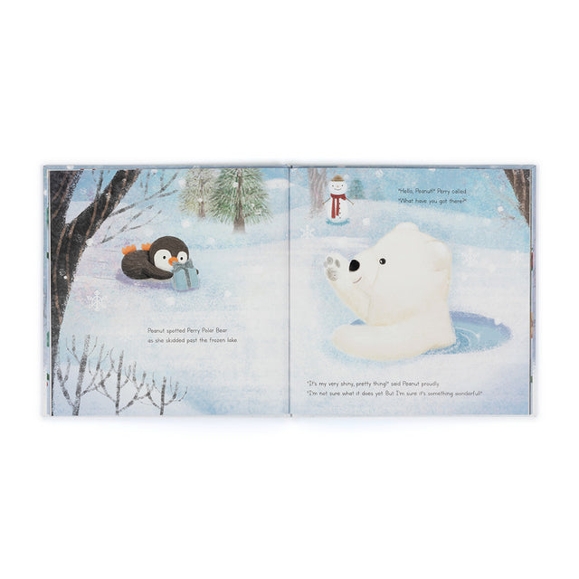 An open children's book shows a penguin with a gift and a polar bear in a snowy landscape.