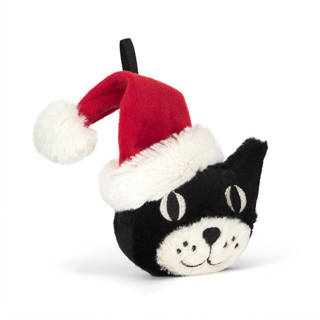 A black cat ornament wearing a red and white Santa hat.