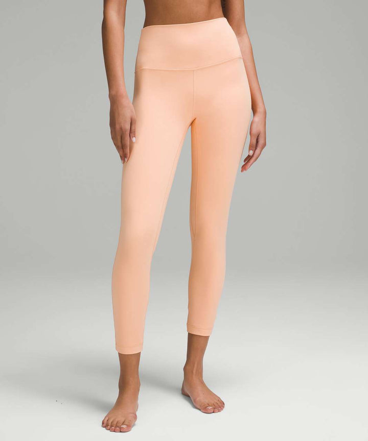 Peach Bellini lululemon Align high-rise 25" leggings.