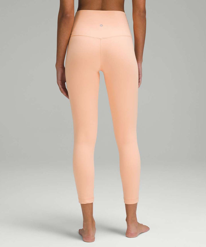 Peach Bellini lululemon Align high-rise 25" leggings.
