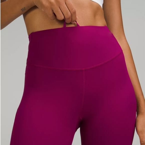 Wildberry Base Pace High-Rise Tight 25" leggings with a drawstring.