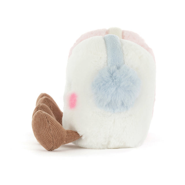 A plush marshmallow toy with pink and white sections, wearing blue earmuffs, and brown corduroy feet.
