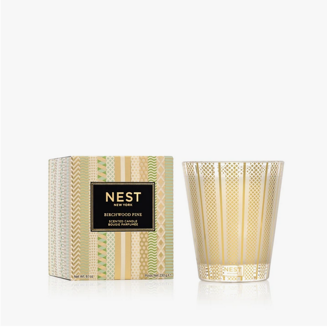 Birchwood Pine Classic Candle with a patterned box and gold-etched glass vessel.