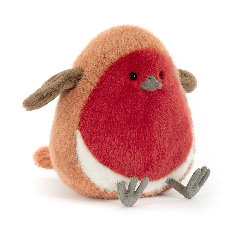 A plush toy robin with a red breast, brown back, and gray feet sits on a white background.