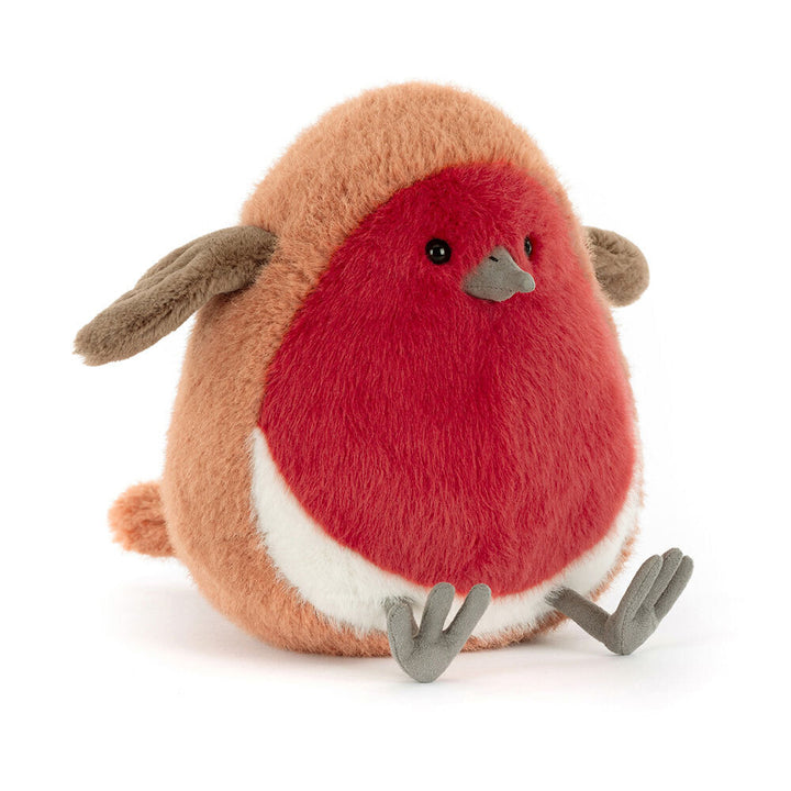 A plush toy robin with a red breast, brown back, and gray feet sits on a white background.