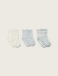 A set of three pairs of infant socks: one pearl, one solid blue, and one blue and white striped.