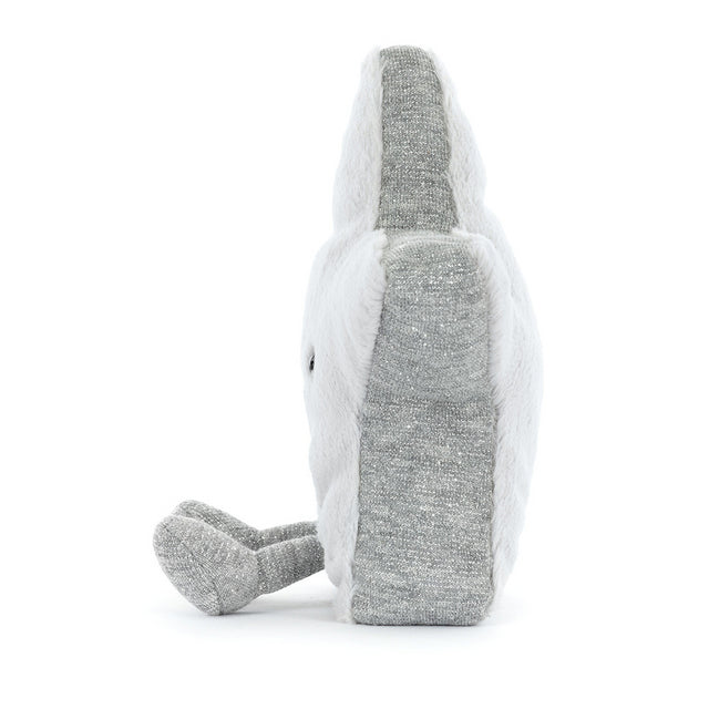A plush silver star with a white fluffy border sits on a white background.