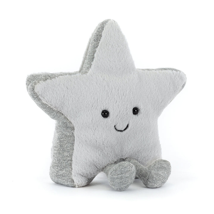 A plush silver star with a smiling face and small legs sits on a white background.